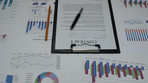 Business Contract On A Desk In A Modern Office alt