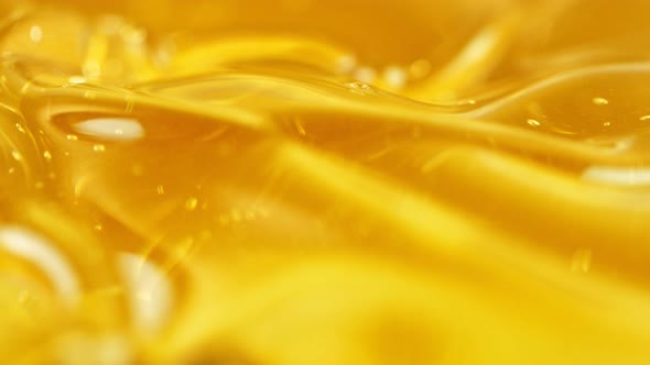 Super Slow Motion Shot of Swirling Oil Liquid at 1000Fps alt