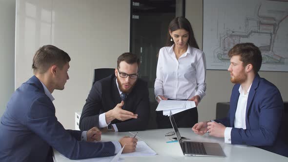 Creative Business Team Meeting in Modern Start Up Office. alt