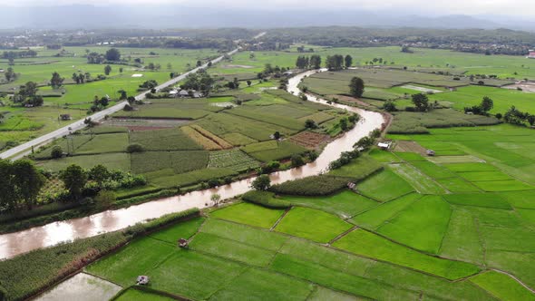 Aerial view over terraced rice paddies in the valley