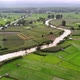 Aerial view over terraced rice paddies in the valley - VideoHive Item for Sale