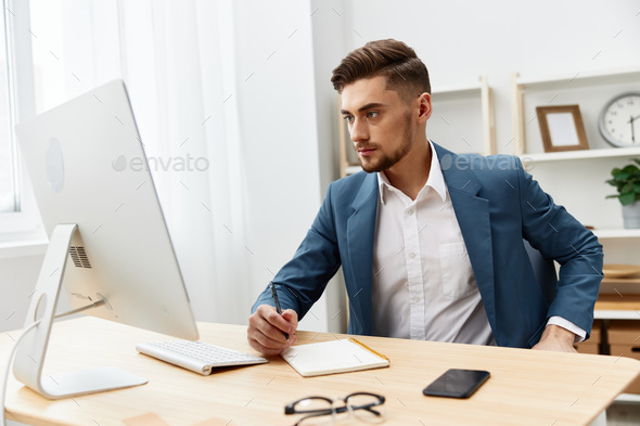 handsome businessman computer desktop work self-confidence paper folder isolated background