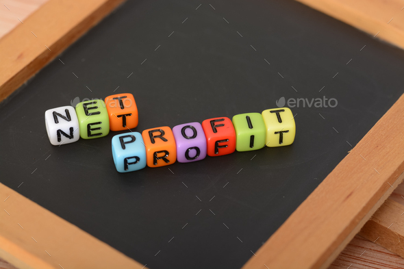 Alphabet beads with text NET PROFIT. Net profit is the amount of money your business earns