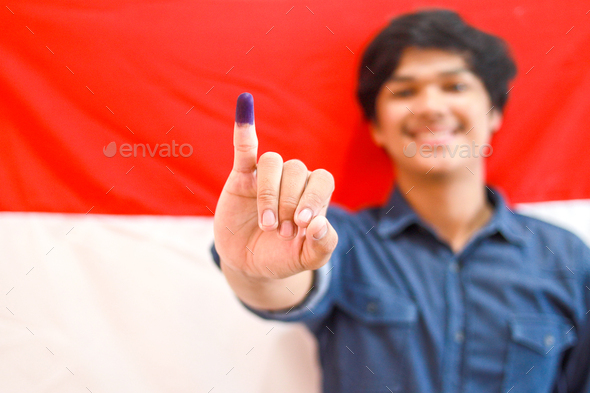 Indonesian Man Showing Inked Finger After Election D