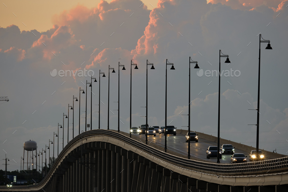Barron Collier Bridge and Gilchrist Bridge in Florida with moving traffic.