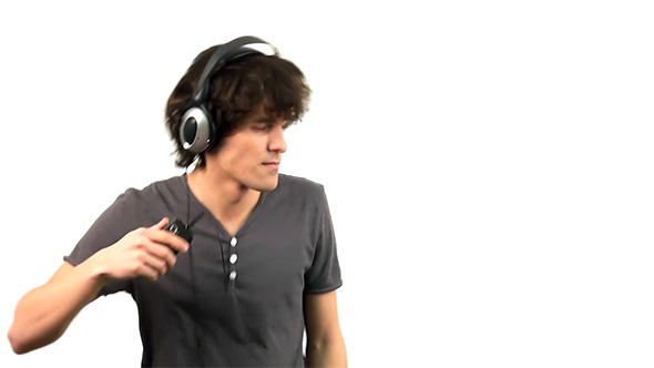 Young Man Listening to Music in Headphones