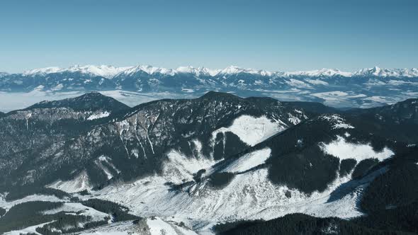 Aerial View of the Snowy High Tatras Mountains in Clear Weather. Slovakia, Chopok alt