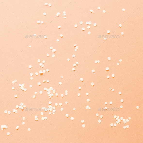 Peach fuzz color abstract background with white flower petals. Floral texture. Flat lay layout. - Stock Photo - Images