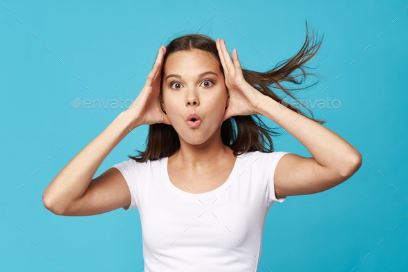 Astonished look beautiful girl shock emotions white t-shirt Stock Photo ...