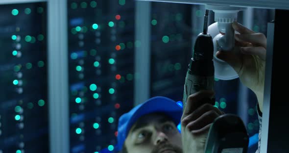 Technician Installing Security Camera alt