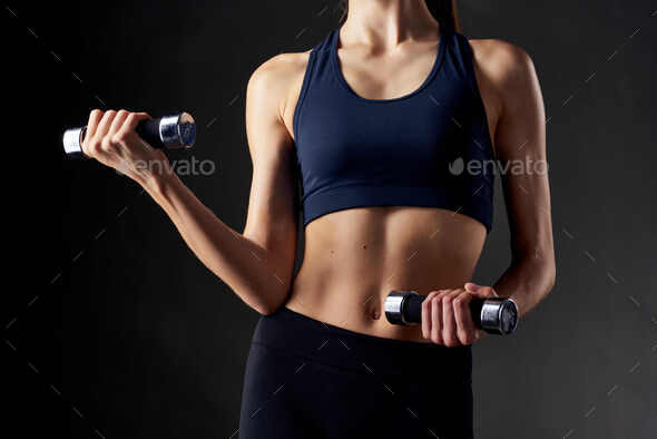 Fit Woman Workout With Dumbbells In Gym Studio Photography Of A