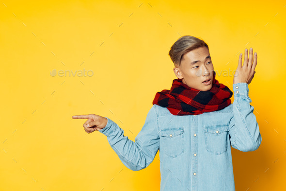 men wearing plaid scarf asian appearance blue shirt gesturing with hand ...