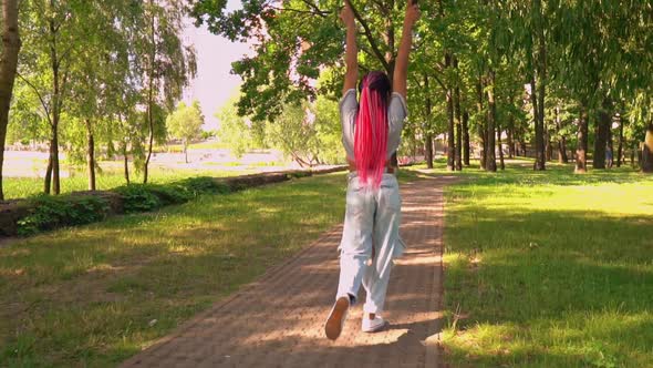 Rear Female Celebrates Triumph alt