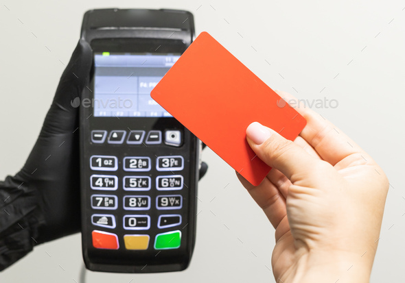 Pay money credit card for spending money with Payment machine. Copy space and empty place for