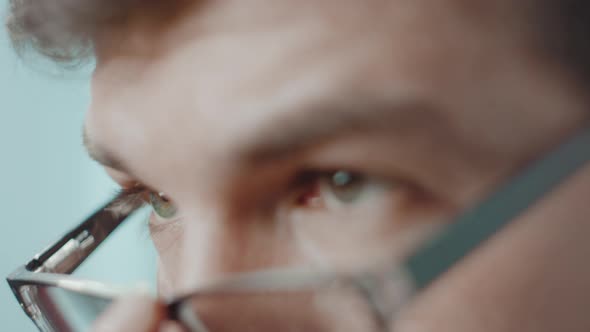 Tired CEO Businessman in Office Wearing Square Glasses Man with Serious Strict Look Executive alt