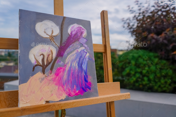 A close-up of easel for painting that stands in the studio concept of the  love of fine art Stock Photo by guyswhoshoot