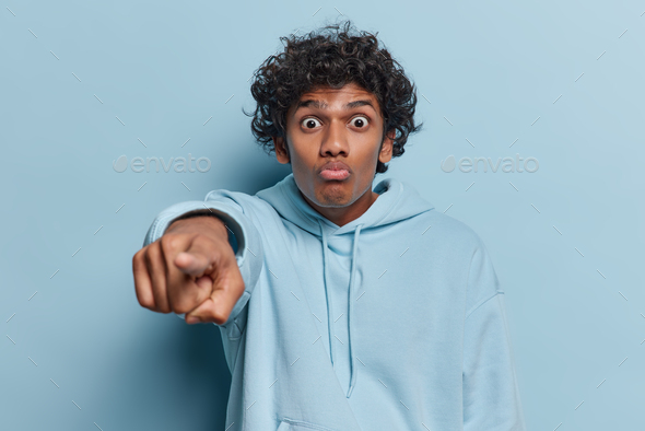 Shocked Handsome Curly Haired Hindu Man Points Index Finger At Camera ...