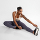 Athletic African American Woman Exercising Stretching Legs Muscles