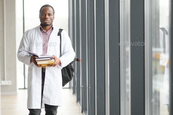 Portrait of a young african ethnicity physician or medical student in uniform