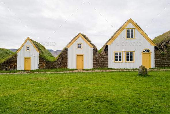 Facades of the Glaumbaer Three turf houses in Iceland - Stock Photo - Images