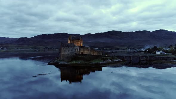 Castle at Donan Island and Clouds Reflecting on the Water alt