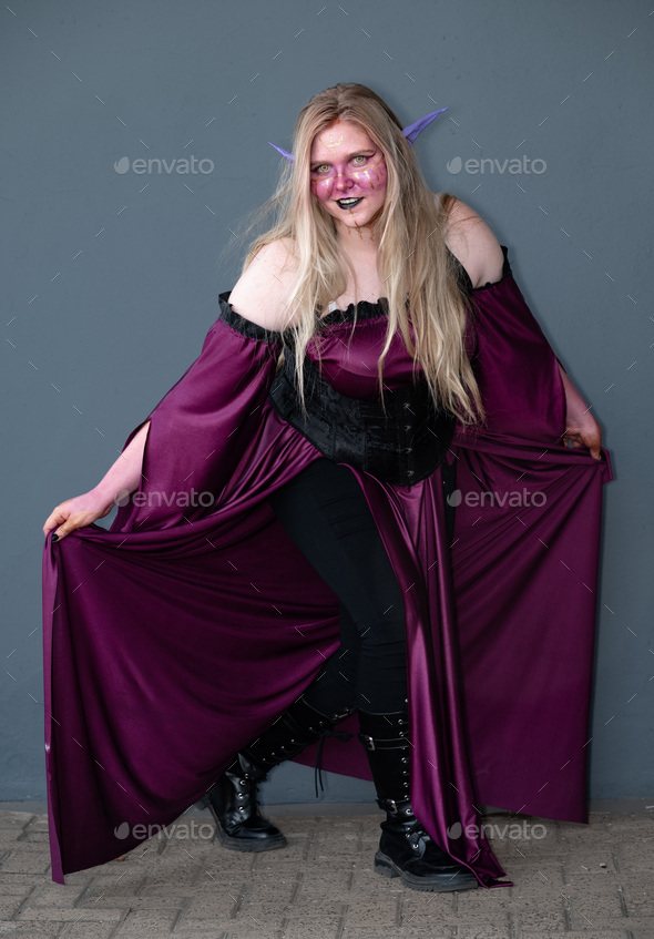 Female cosplayer in a fantasy witch costume Stock Photo by wirestock