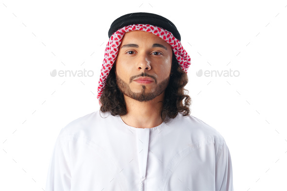Portrait of an Arab Emirati Gulf man wearing traditional Emirati dress,  offering dates and hot coffee, hospitality and reception, facial gestures  indicating joviality and welcoming guests, white background - Photo #86573 -