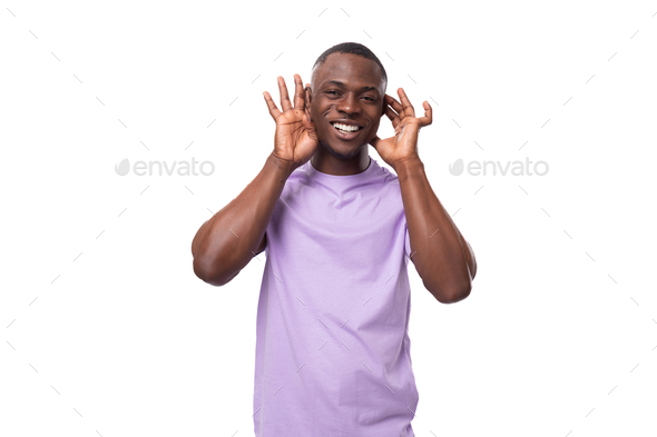 young african man of normal build dressed in a basic light lilac t-shirt with print mockup