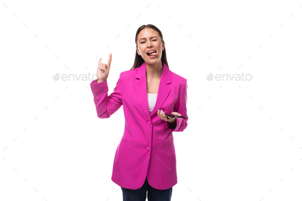 young slender brunette secretary woman wearing a lilac jacket uses a smartphone