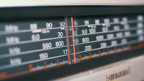 Tuning Analog Radio Dial Frequency on Scale of the Vintage Receiver alt