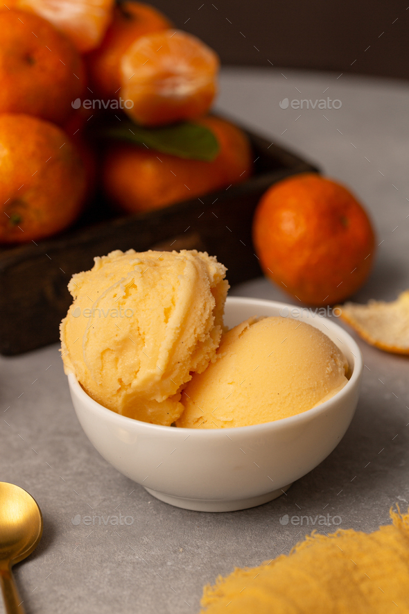 Balls of natural tangerine ice cream Stock Photo by natalya_ugr | PhotoDune