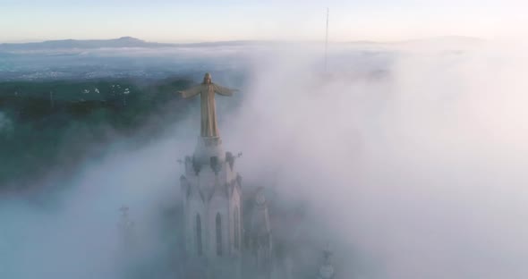 Aerial View Church of the Sacred Heart of Jesus Tibidabo Spain on Foggy Morning