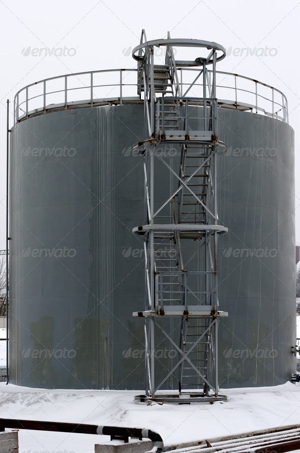 gray storage tank with stairs