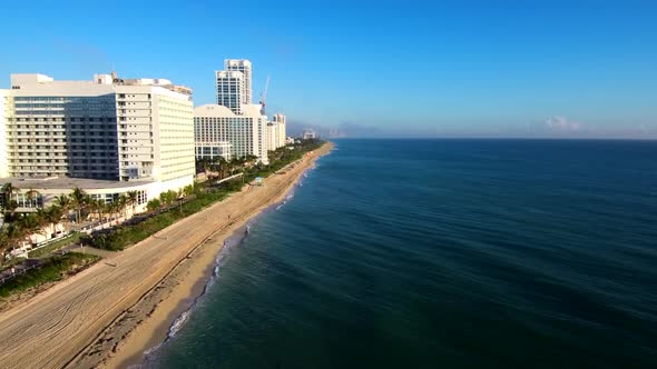 Aerial footage viewing the Miami beach on a sunny morning