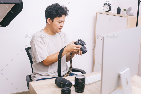 Photographer Operating Camera