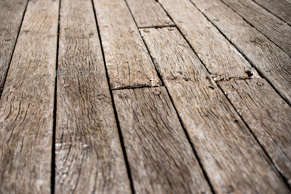 an old, wooden surface is covered in cracks and scratches - Stock Photo - Images