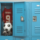 Soccer equipment football ball, t&#39;shirt and bbots in a school locker room. - PhotoDune Item for Sale