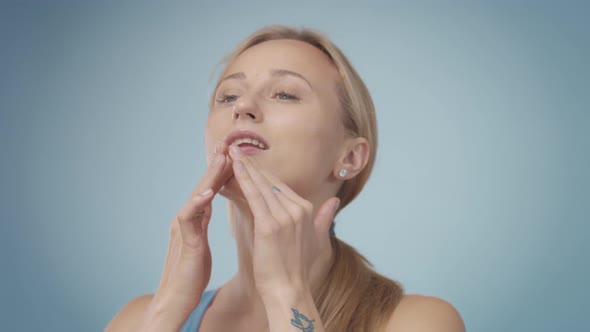 Blonde Model During Facial Treatment Routine