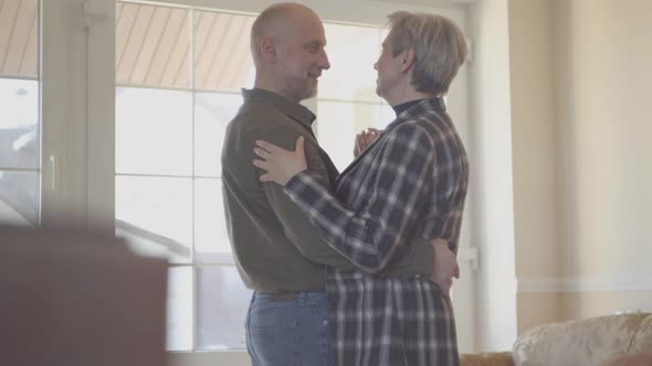 Mature Couple in Love Dancing Slow Dance Indoors alt