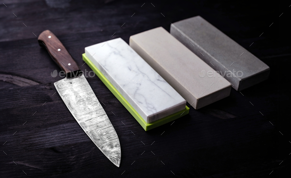 Kitchen Table Displays Large Knife And Sharpening Whetstones Set