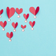 Red paper hearts isolated on blue background - PhotoDune Item for Sale