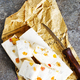 Pieces of delicious nutty nougat on table - PhotoDune Item for Sale