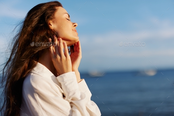 Woman beauty smile with teeth freedom on vacation walking on the beach ...