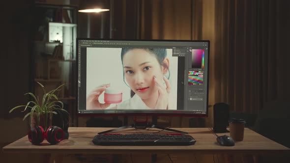 Desk With Photo Editing Software On Personal Computer With Big Display At Night alt