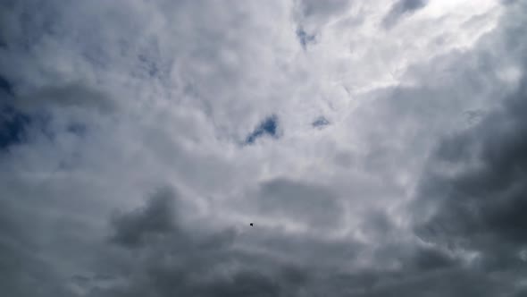 Clouds Move Smoothly in the Blue Sky. Timelapse alt