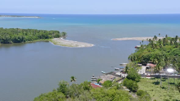 Drone view of Soco river mouth entering the ocean with sandbanks alt