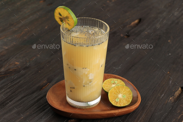 Es Kelapa Muda Jeruk Fresh Grated Coconut With Orange Syrup And Sweet Basil Seed Selasih Stock 