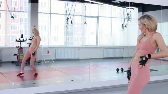 Woman dancing in a sports club during workout