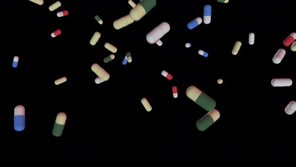 Colorful medicines fall down pills, antibiotics, vitamins,