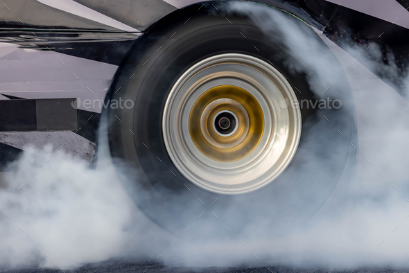 Car burnout wheels tire with white smoke,Car wheel burnout with smoke ...